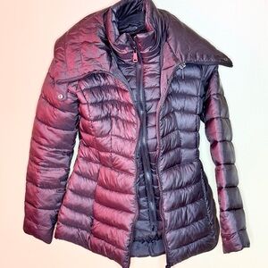 STAY WARM in this Bernardo Women's Black Puffer Jacket w/ Inner Liner Zipper